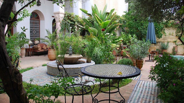 mediterranean garden with mediterranean tiles