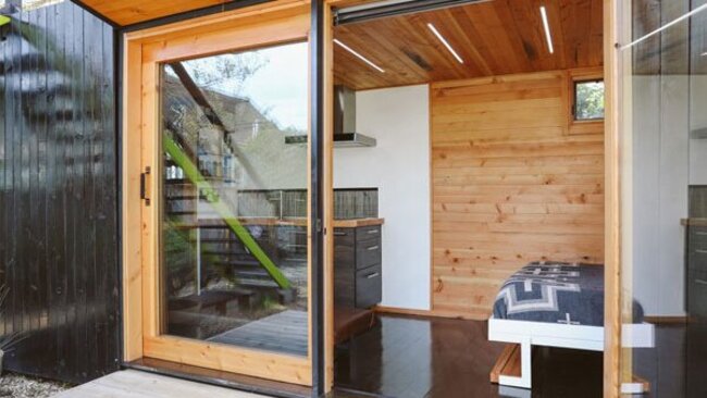 Tiny house with sliding doors