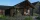3D render of a ranch house with addition by cedreo