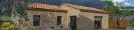 Renderizado en 3D de una casa con fachada de piedra para el encabezado de un artículo de blog.