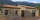 Renderizado en 3D de una casa con fachada de piedra para el encabezado de un artículo de blog.