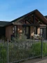 3D render of a front facade of a ranch-style house designed with Cedreo